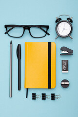 Set of office items lie on the table. Minimalistic set for work and study