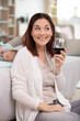 © auremar - woman drinking alcohol with her sleeping baby