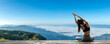 © pakorn - Young woman practicing yoga in the nature