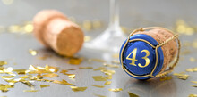 Champagne Cap With The Number 43