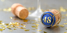 Champagne Cap With The Number 48