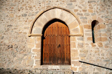 Ancient Wood Church Door With Stone Wall