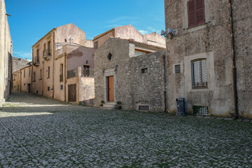 Wall Mural - Historic medieval ancient town village of Erice, Sicily Italy with romantic narrow cobblestone streets alleys backstreets, old facade houses buildings, churches and panoramic scenic landscape view