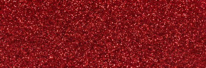 Wall Mural - Red sparkling glitter background, christmas shiny texture. Holiday lights. Abstract defocused header. Wide screen wallpaper. Panoramic web banner with copy space for design
