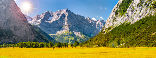 Poster - panoramic view to Karwendel mountains with rock and sun