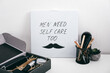 © irissca - Men self care kit black box with male beauty care products and devices and letter board with text Men need self care too. Man self care package or gift box for boyfriend, husband, father or brother