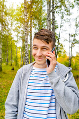 Wall Mural - Young Man with a Phone