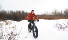 Nice Man Riding A Fat Bike In Winter