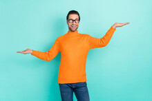 Portrait Of Positive Person Look Arms Palms Demonstrate Empty Space Proposition Isolated On Teal Color Background