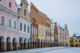 Fototapeta Miasto - Square in old Telc town in winter dark cold morning