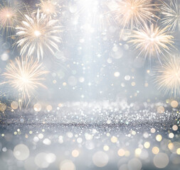 Wall Mural - silver celebration with fireworks and glitter - new year anniversary with defocused abstract lights
