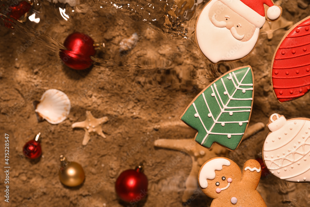 Christmas cookies floating on water at sea resort