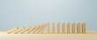 Leinwandbild Motiv Risk concept. Wooden block stopping domino effect for business. 3d illustration
