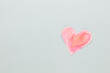 Cut the heart shaped paper, put on a pastel background.