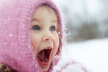 Emotional Portrait Of A Little Girl Baby. Scream. Joy. Emotions. Winter. Holidays. Christmas. Walking In Winter