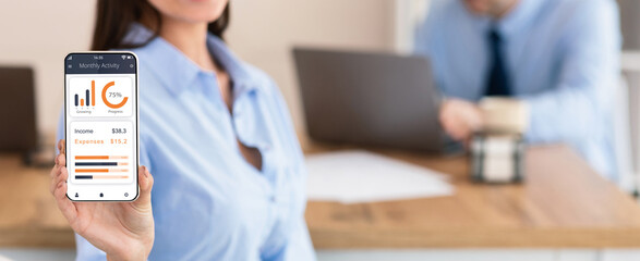 Aufkleber - Unrecognizable lady showing smartphone with financial mobile app