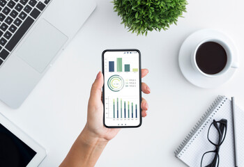 Aufkleber - Business lady hands holding mobile phone with trading app