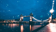 Famous Tower Bridge In The Evening Snow, London, England