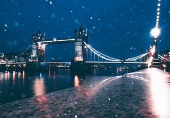 Famous Tower Bridge in the evening snow, London, England