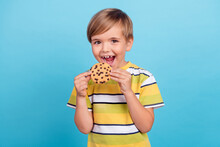 Photo Of Young Small Happy Boy Hold Hands Cookie Hungry Tasty Sugar Smile Isolated On Blue Color Background