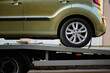Closeup car fixed on tow truck vehicle