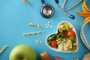 Diet food for health with heart bowl and stetoscope detail