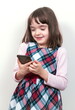 © gmstockstudio - Little child girl with the phone