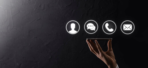 Businessman hand holding,pressing on icon phone, mail, telephone,message,post and person,user. Customer service call center contact us concept.Banner,copy space.Contact Methods.