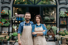Owners Of Flower Shop Near Showcase Outdoor