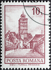 Wall Mural - Romania - circa 1972: A post stamp printed in Romania showing the Sibiu - The Town Hall