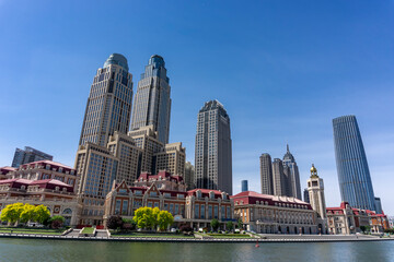 Wall Mural - Bridge,City scenery and modern architecture skyline by the Haihe River in Tianjin, China