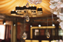 Hanging Glass And Shiny Beads Are An Element Of The Wedding Decor.