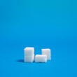 © Amar - sugar cubes on a blue background