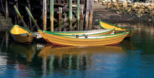 Yellow Boats At The Wooden Pier