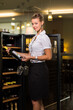 © lightpoet - Cute female sommelier, wine waiter choosing the right wine to go well with food in a restaurant
