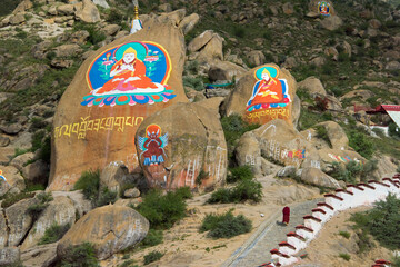 Poster - Image of Buddha painted on rock, Drepung Monastery, one of the great three Gelug university monasteries of Tibet, Lhasa, Tibet, China