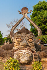 Wall Mural - Xieng Khuan (Xiengkuane), Buddha Park containing over 200 Hindu and Buddhist statues. South of Vientiane, Capital of Laos, Southeast Asia