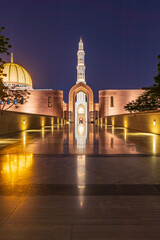 Wall Mural - Middle East, Arabian Peninsula, Oman, Muscat. Night view of the Sultan Qaboos Grand Mosque in Bawshar.