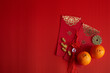 © vetre - Chinese new year festival decorations. Orange, red packet, on red background.