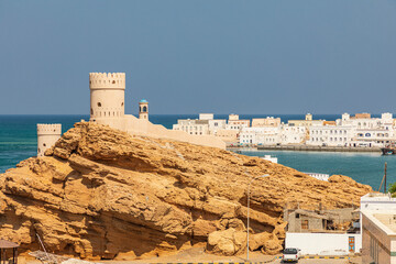 Wall Mural - Middle East, Arabian Peninsula, Al Batinah South. Tower at the harbor entrance in Sur, Oman.