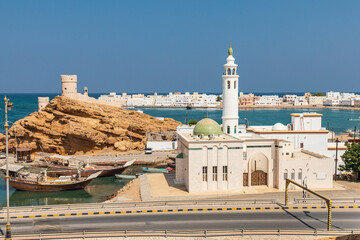 Wall Mural - Middle East, Arabian Peninsula, Al Batinah South. Small mosque on the harbor in Sur, Oman.