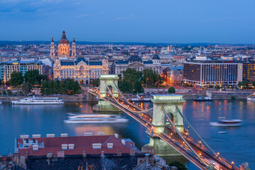 Wall Mural - Hungary, Budapest. Szechenyi Chain Bridge across the Danube River. illuminated at night, built between 1839-49 it is supported by two towers and stretches 1,250 ft (390 meter).