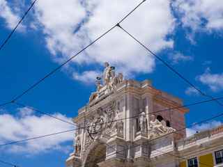 Wall Mural - Portugal, Lisbon. The sculptures at the top of 18th century Arco da Rua Augusta. Statue of Glory rewarding Valor and Genius.