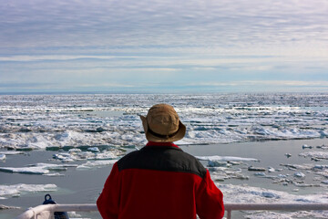 Wall Mural - Cruise ship sailing through floating ice on Bering Sea, Russia Far East