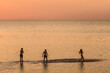 Leinwanddruck Bild - Sweden, Scania, Malmo, Riberborgs Stranden beach area, beach goers, sunset