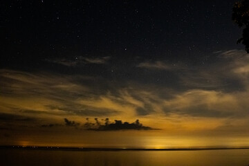 Canvas Print - Starry night sky over the lake