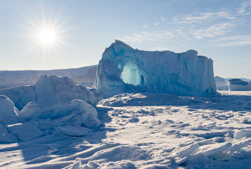 Poster - Icebergs frozen into the sea ice of the Uummannaq fjord system during winter. Greenland, Danish Territory