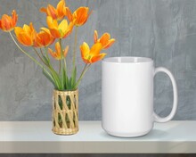 White 15 Oz. Mug Mockup With  Orange Flowers