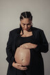 Black Pregnant Model with Cornrows