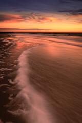 Sticker - USA, New Jersey, Cape May National Seashore. Sunrise on ocean shore.